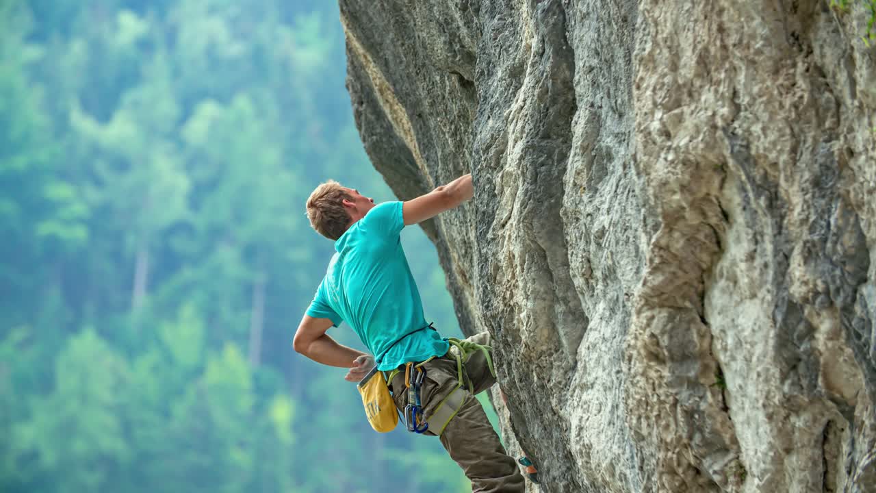 Rock climber elevating with struggle at Burjakove Peci Topla