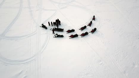 drone view of ice fishing in saariselka, lapland, finland