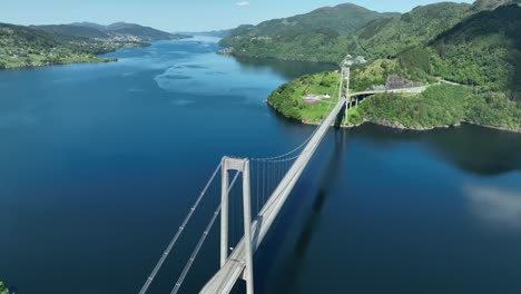 Suspension-bridge-from-Bergen-mainland-to-Osteroy-island-Norway,-Aerial