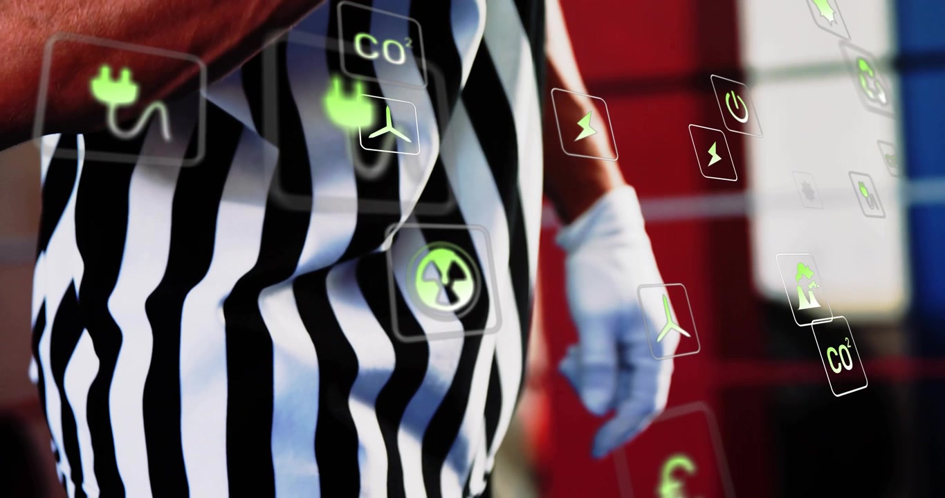 Artista di motion capture che gesticola per selezionare e disporre icone di energia, mostrando un sistema energetico.