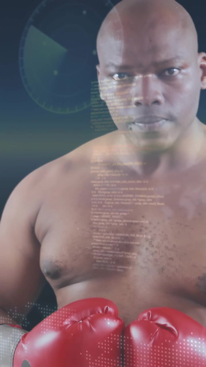 Vertical video: Male boxer holding gloves squaring up for fitness camera zooming showing overlays