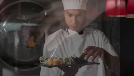 Animation-of-frying-pan-over-male-chef-serving-sushi