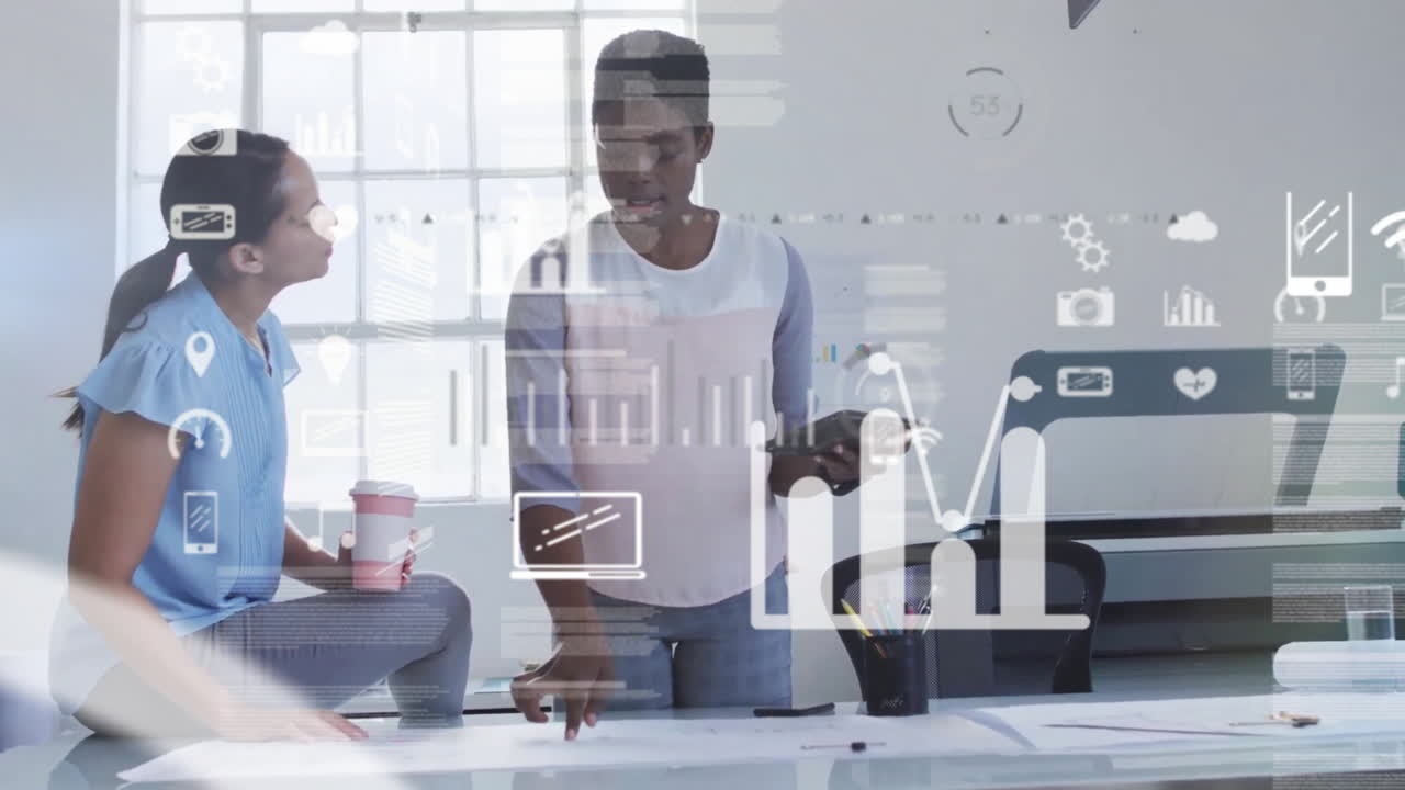 Animation of data processing and diagrams over diverse businesswomen talking in office