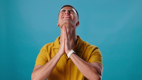 man praying with gratitude