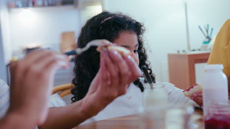 african-american family enjoying breakfast at home