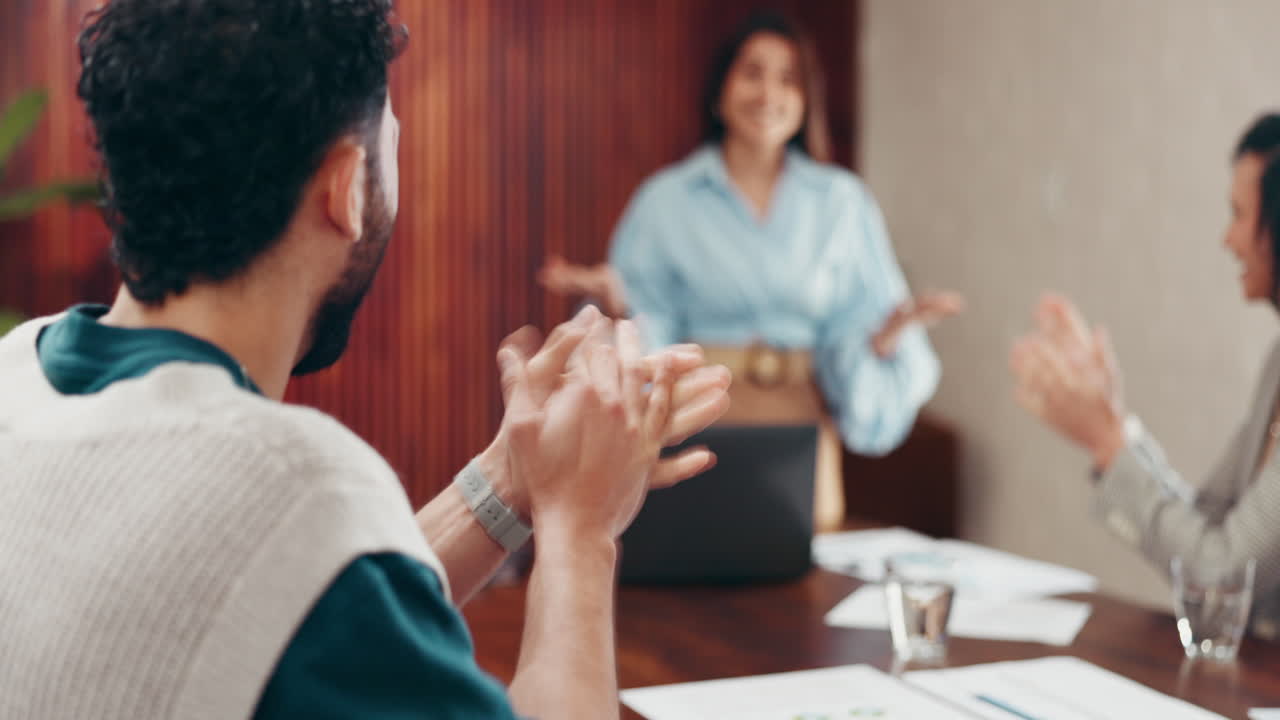 Business team celebrating success during a meeting