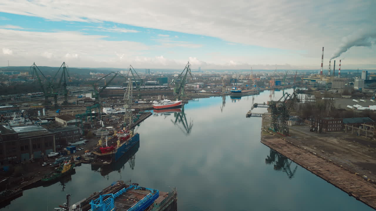 Aerial View of Shipyard with Cranes and Ships
