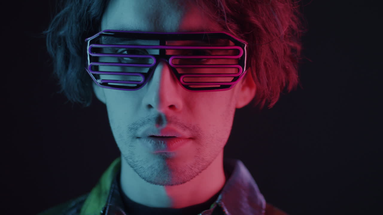 Man in Neon Glasses