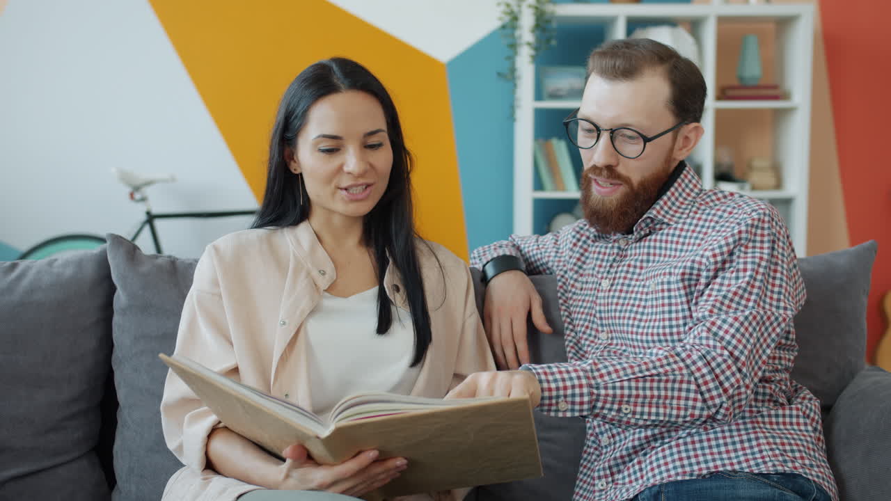 Couple Looking Through a Photo Album