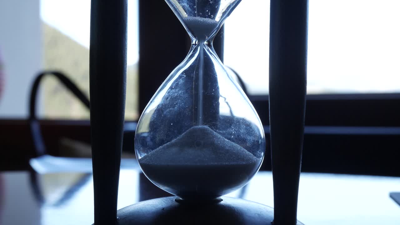 Hourglass close-up shot. Time is up