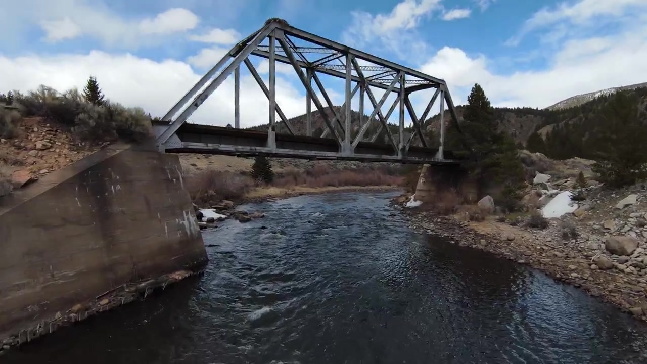 4K Drone of Train Bridge and Mountains