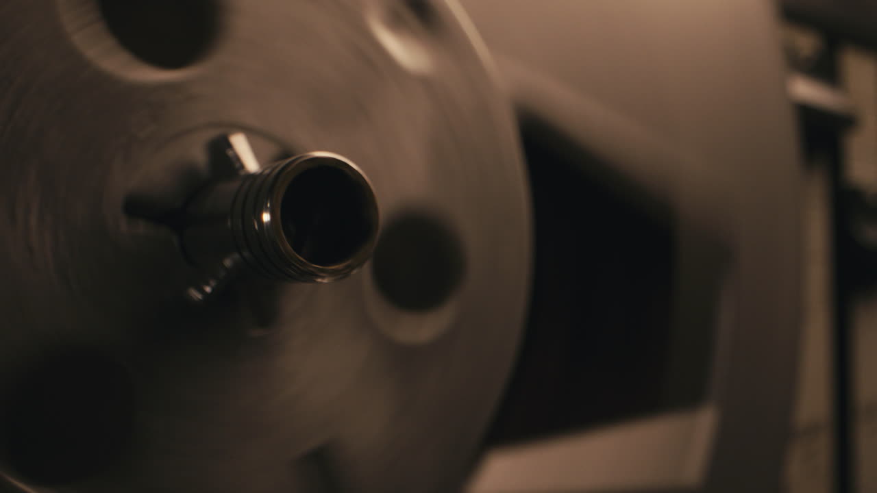 A vintage tape recorder in a pulsing light