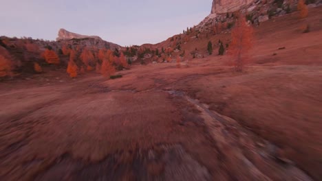 flying through the stunning landscape of cinque torri, dolomites, italy - fast aerial shot