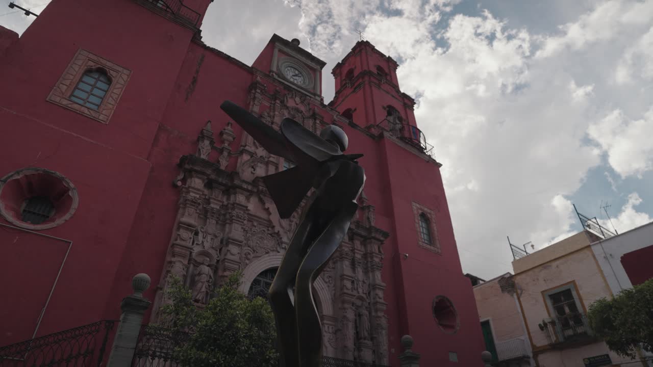 Red Church and Statue