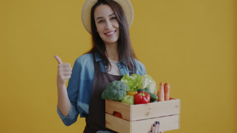 happy farmer showing fresh produce