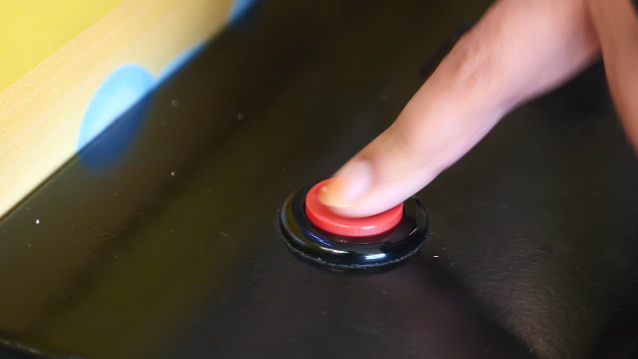 Pressing a red button