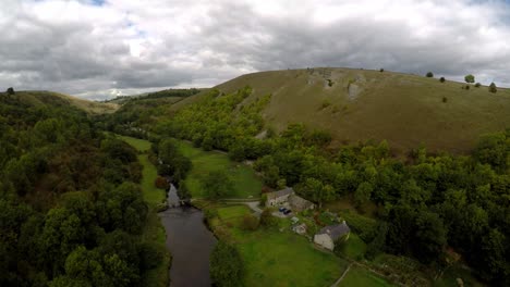 aerial view of the farm by headstone viaduct, bridge in the derbyshire peak district national park, bakewell, commonly used by cyclists, hikers, popular with tourists and holiday makers