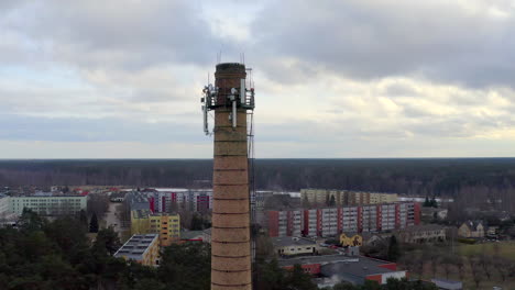 drone shoot of repurposed chimney supporting 5g cellar antennas