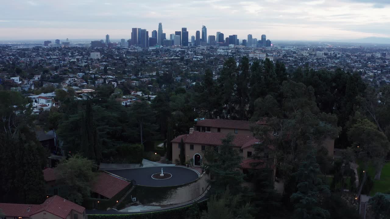 Aerial close-up panning shot of the glamorous Paramour Estate at low light in Hollywood, California. 4K