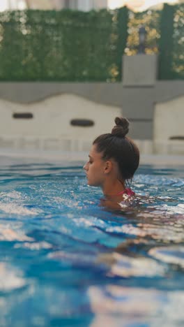 woman relaxing in a swimming pool