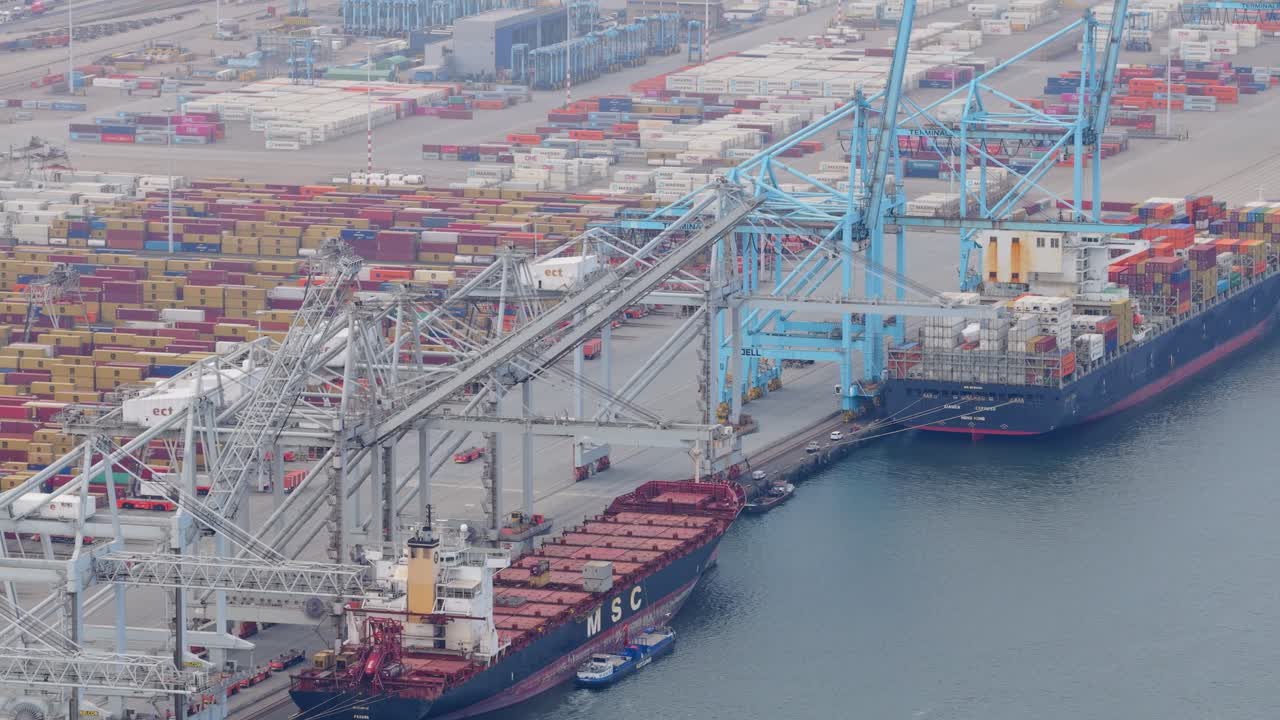 Aerial container terminal with ships loading export cargo in Rotterdam port