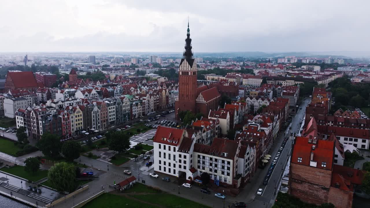 Heavy rain over Elblag old town Poland shows climate shift and urban resilience