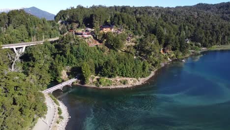 drone shot of the beautiful houses around the stunning lake