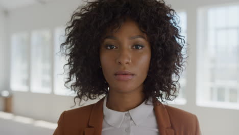 portrait-of-attractive-african-american-woman-looking-serious-at-camera-independent-stylish-black-female-professional-entrepreneur