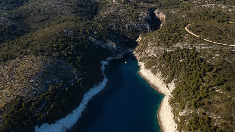 a bird's eye view of the beach stiniva cove beach of adriatic sea, vis island,dalmatia, croatia