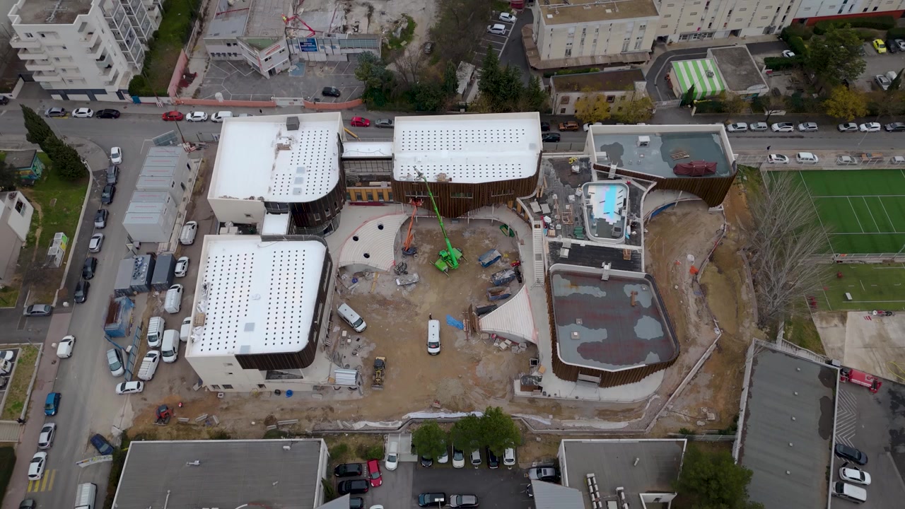 Aerial Drone Top Down Construction Site Revealing Streets in Montpellier France