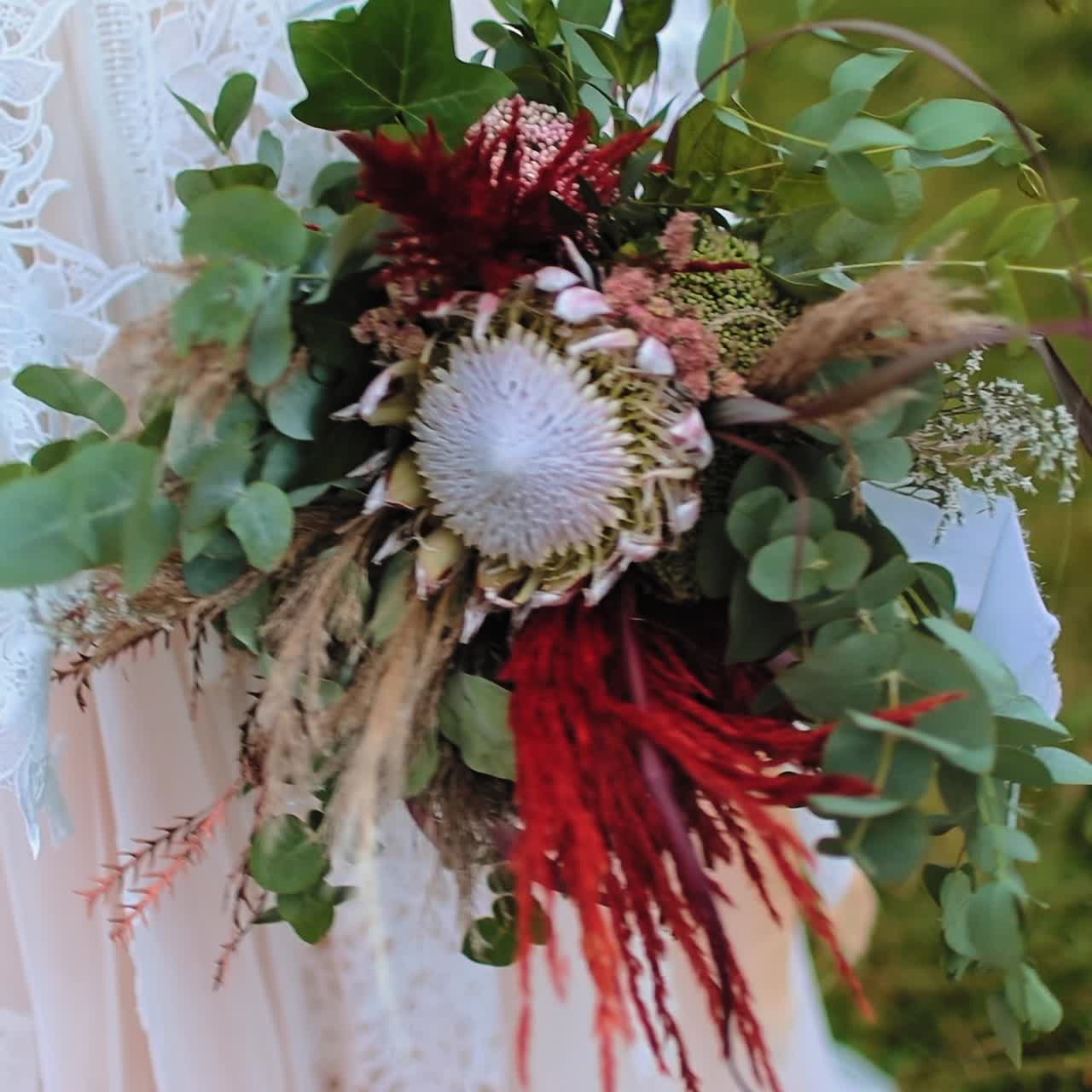 Wedding bouquet in bride hands