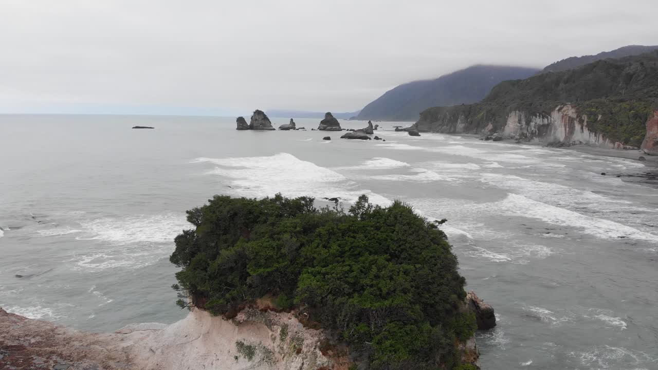 Aerial view of New Zealand coast on an overcast windy summer day