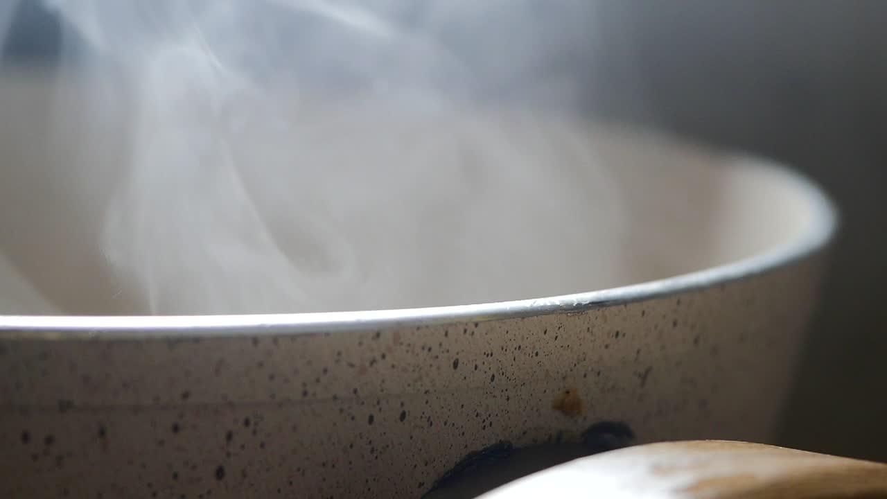 Steam rising from a cooking pot