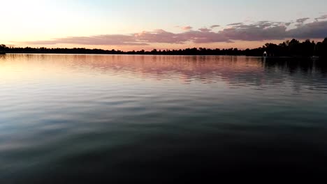 sunset over a beautiful calm lake after day of fishing in africa