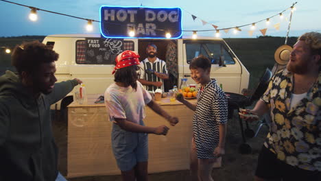 Joyous-People-Dancing-at-Outdoor-Summer-Party