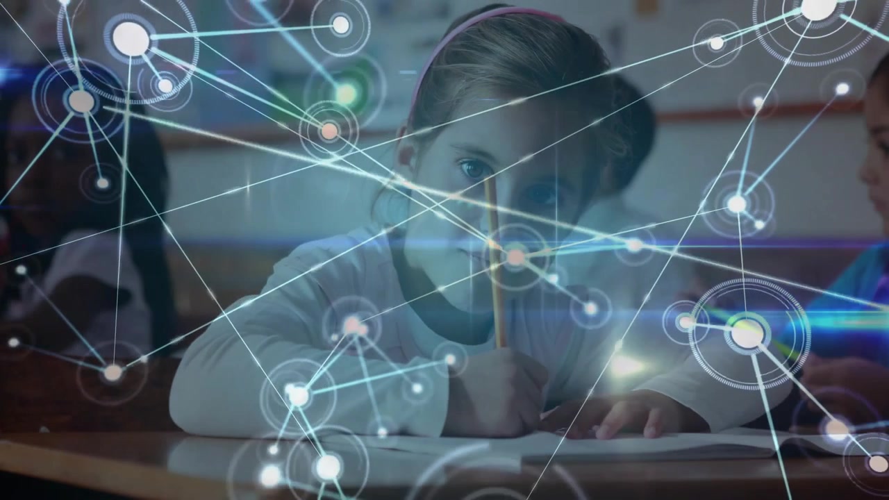 Girl writing at classroom desk initiating expanding digital education network overlay for learning