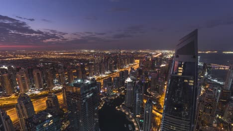 4k timelapse - aerial view of cityscape and city skyline in marina.dubai.uae at sunrise