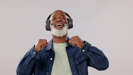 senior, happy man and dancing with headphones to