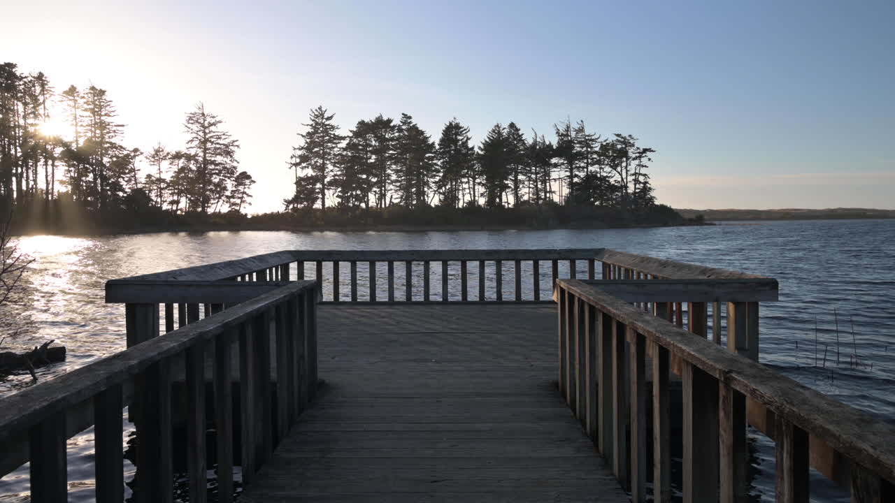 View Of Lake From A Fishing Pier - Garrison Lake, Port Orford, Oregon - tilt up shot