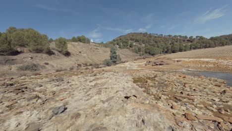 dynamic fpv drone pov flight up rocky dry