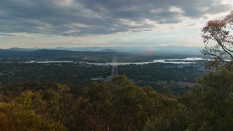 4k view of canberra overlooking lake burley griffin from above, showcasing australia’s capital city with iconic landmarks, natural landscapes, and urban design in stunning detail.