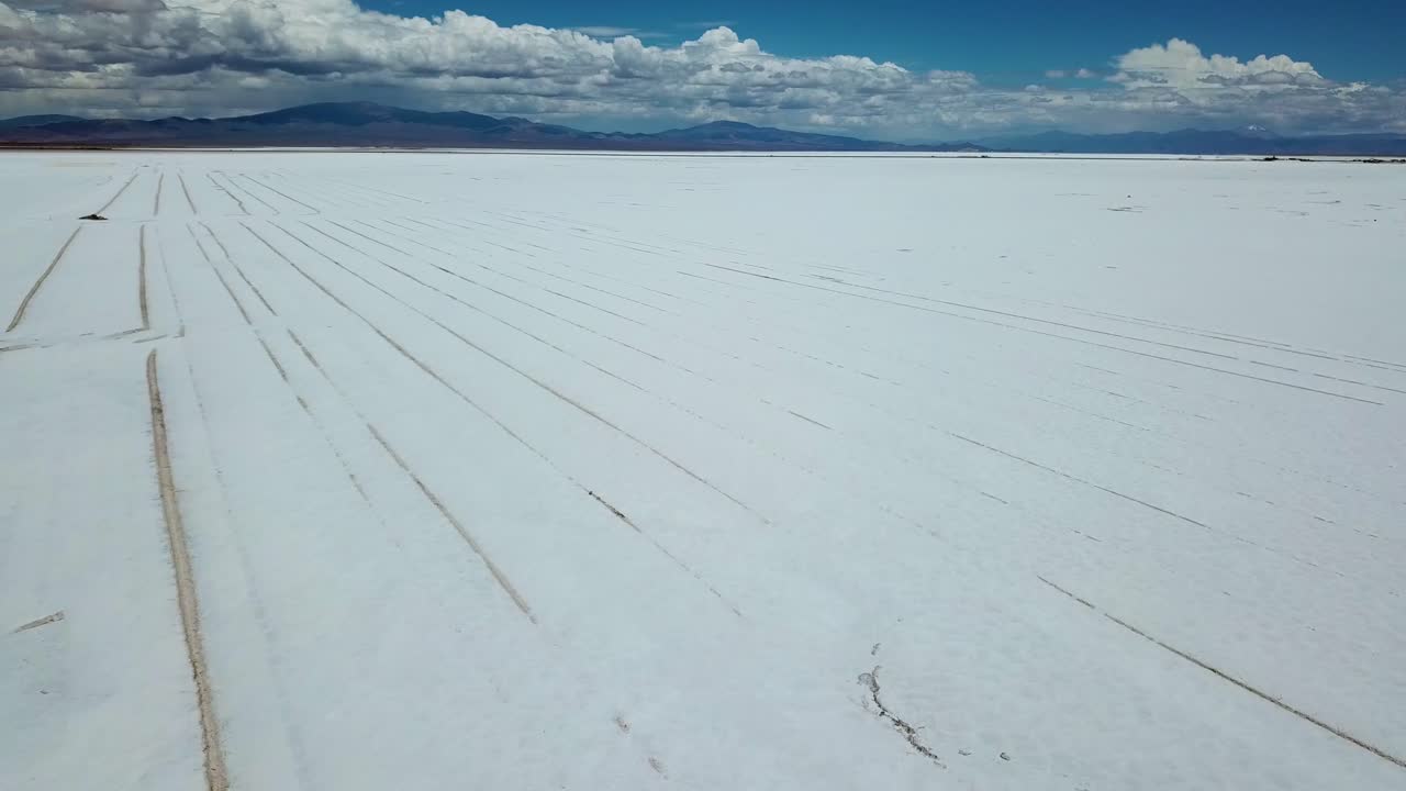 Aerial View of Amazing Salt Flat Valley Under Fluffy Sky. Salinas Grandes, Argentina