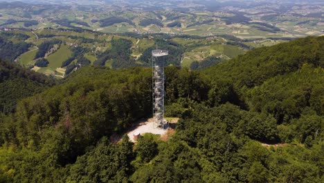 aerial view of observation tower wit beautiful nature view of slovenia during sunny day