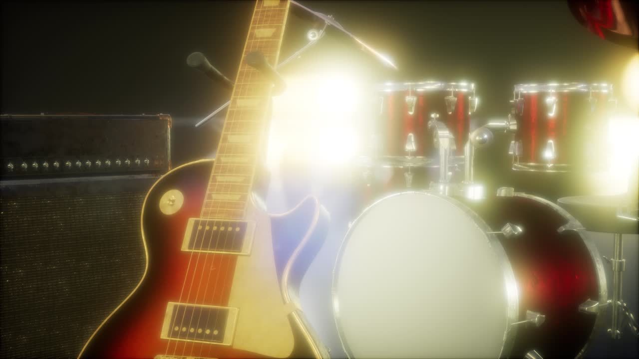 드럼과 기타가 무대 조명 속에 있습니다.