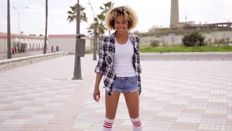 Unidentifiable-woman-stepping-on-skateboard