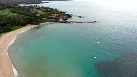 beautiful blue kauna'oa crescent beach and bay