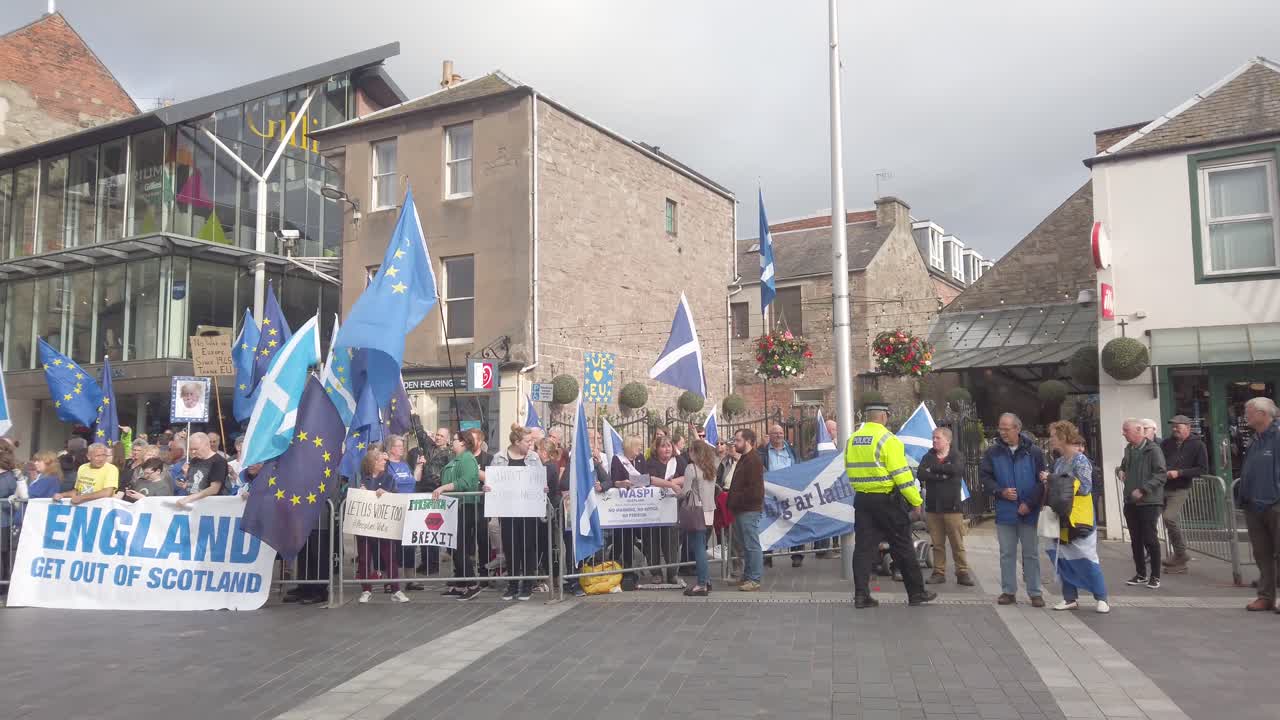 Scottish protesters and their flags outside the Perth Concert Hall where the Tory Leadership Hustings is being held.