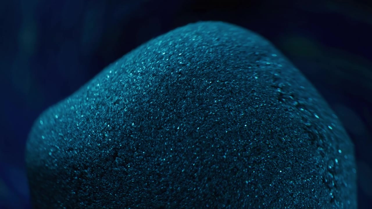 Close-up view of a textured, dark blue sponge