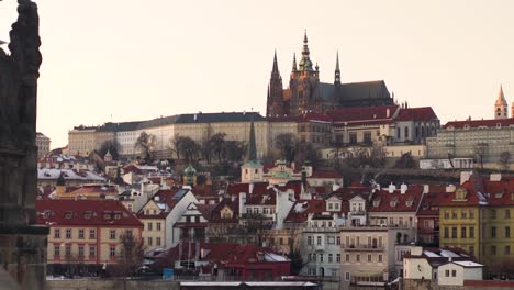 prague castle and historical center at sunset,seagulls flying below