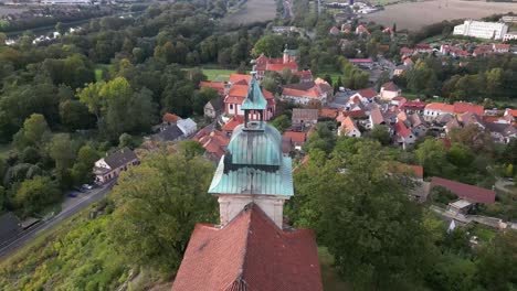 aerial view of the tower of the libechov chapel of the holy spirit and the surrounding area